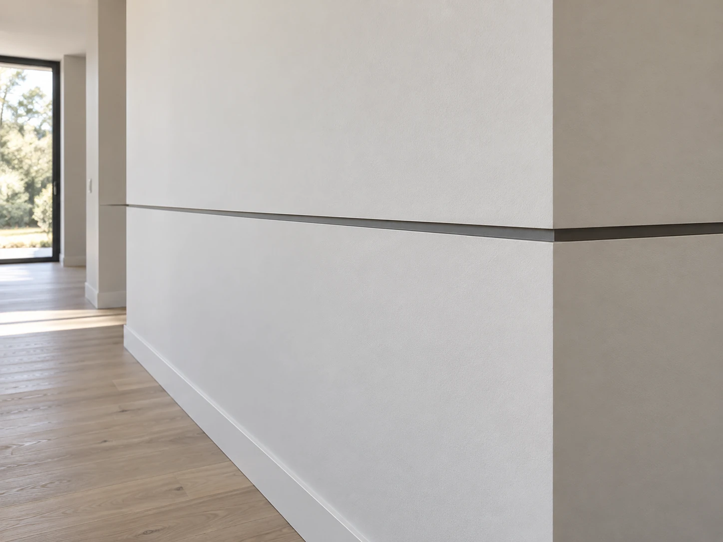 A recessed horizontal wall reveal continuing around an interior corner.