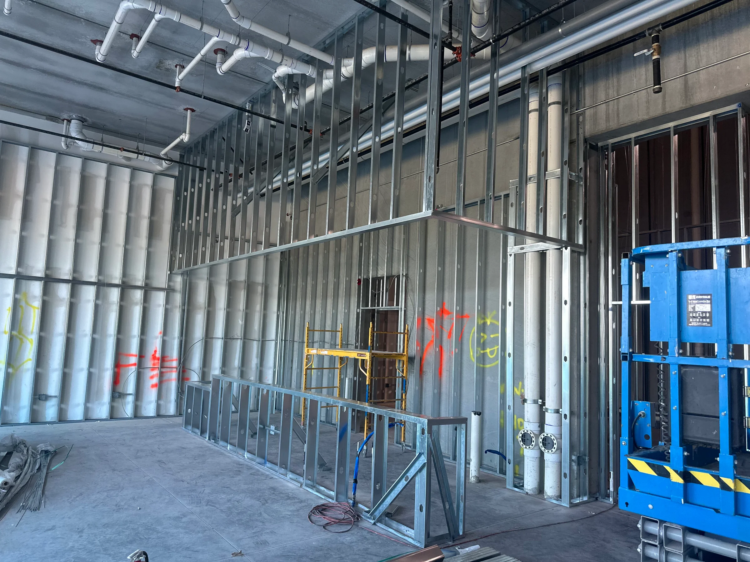 Metal stud framing defining the layout of a commercial interior